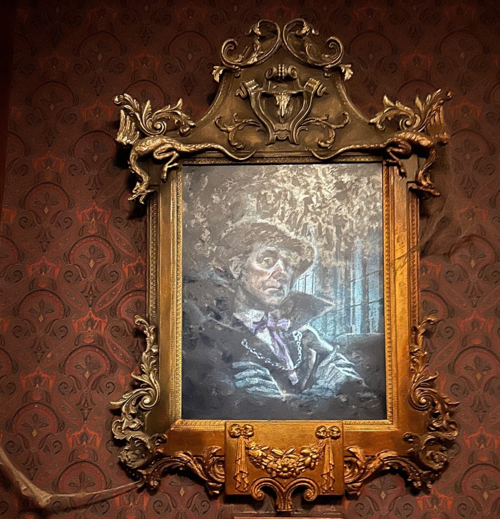 Framed portrait of a man with top hat at Phantom Manor in Disneyland Paris