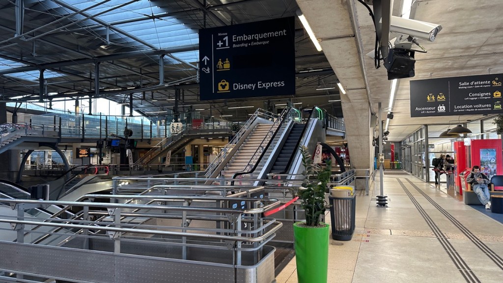 Escaltor with signs to the Disney Express in Marne-la-Vallee station