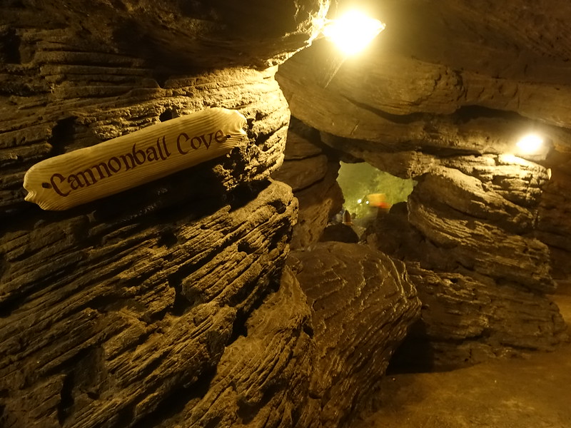 Cave wall with sign reading 'Cannonball Cove'