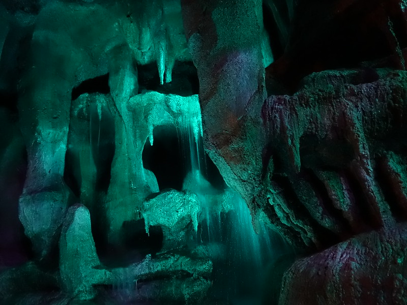 Green lit caves inside Pirates of the Caribbean in Disneyland Paris