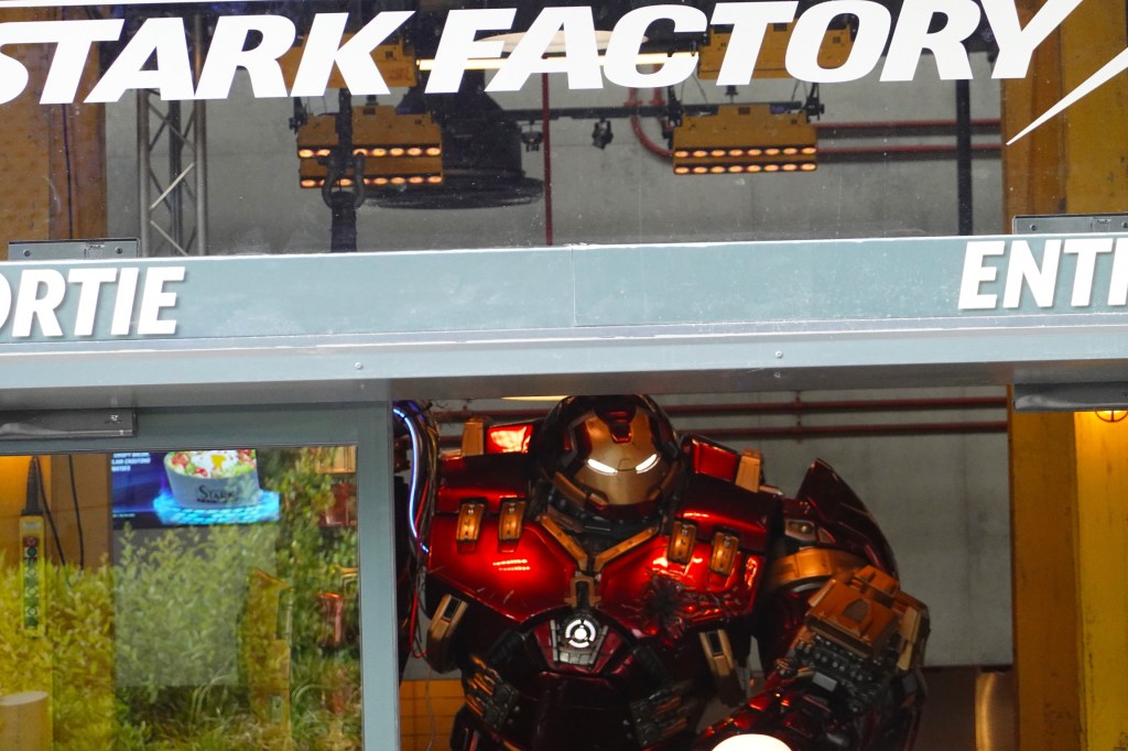 Entrance to Stark Factory restaurant with Hulk Buster inside at Disneyland Paris
