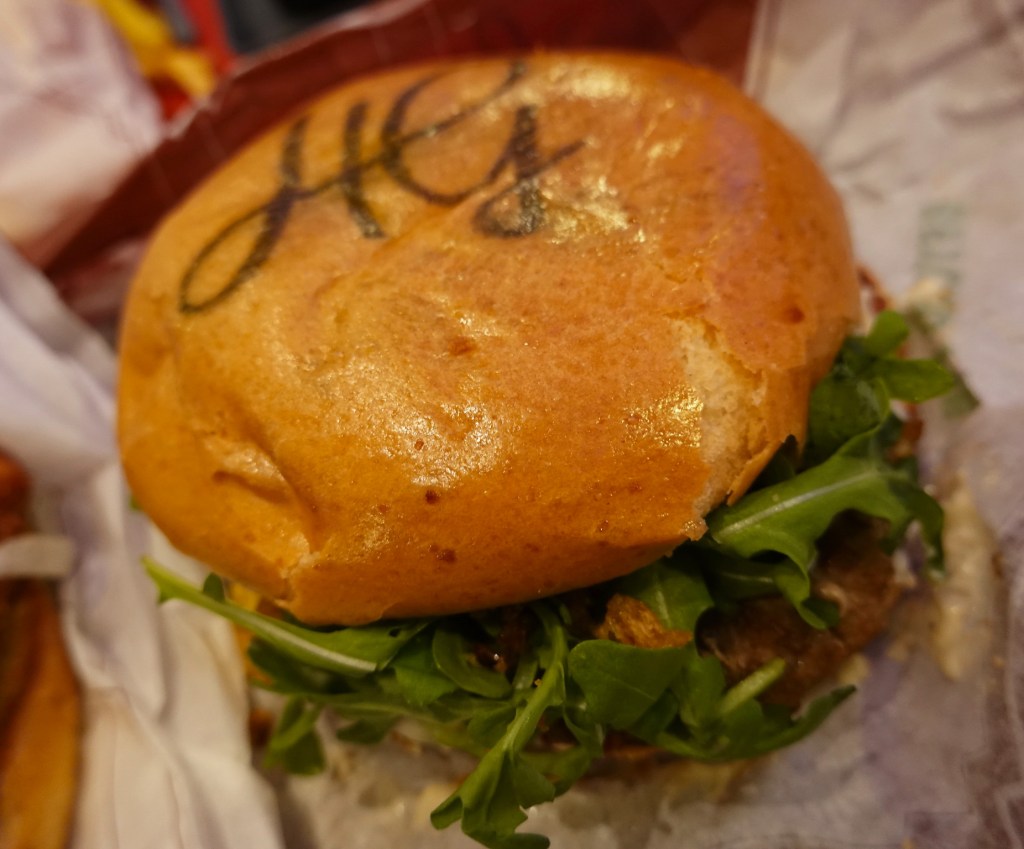 Burger with HG on the bun from the Hollywood Gardens Restaurant in Disneyland Paris