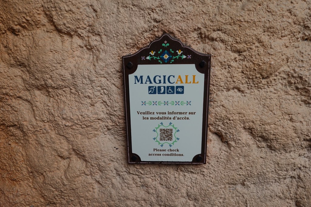 Sign saying MagicALL and with a QR code at Disneyland Paris