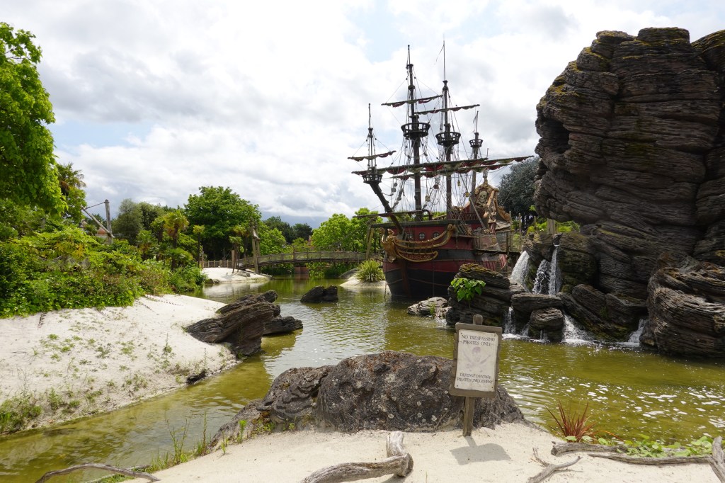 Skull rock and the Jolly Roger at Disneyland Paris