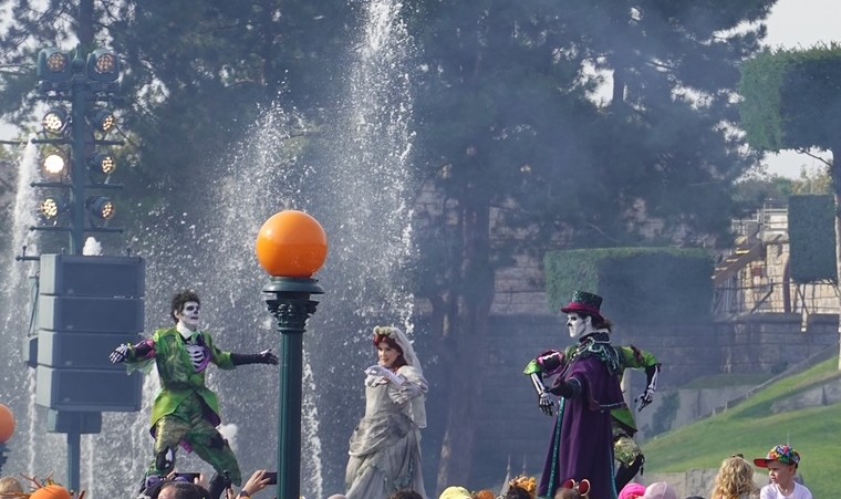 Phantom character, bridge and dancers on stage in Mickey's Halloween Celebration in Disneyland Paris