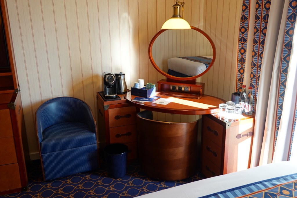 Dressing table and chairs in rooms at Newport Bay Club