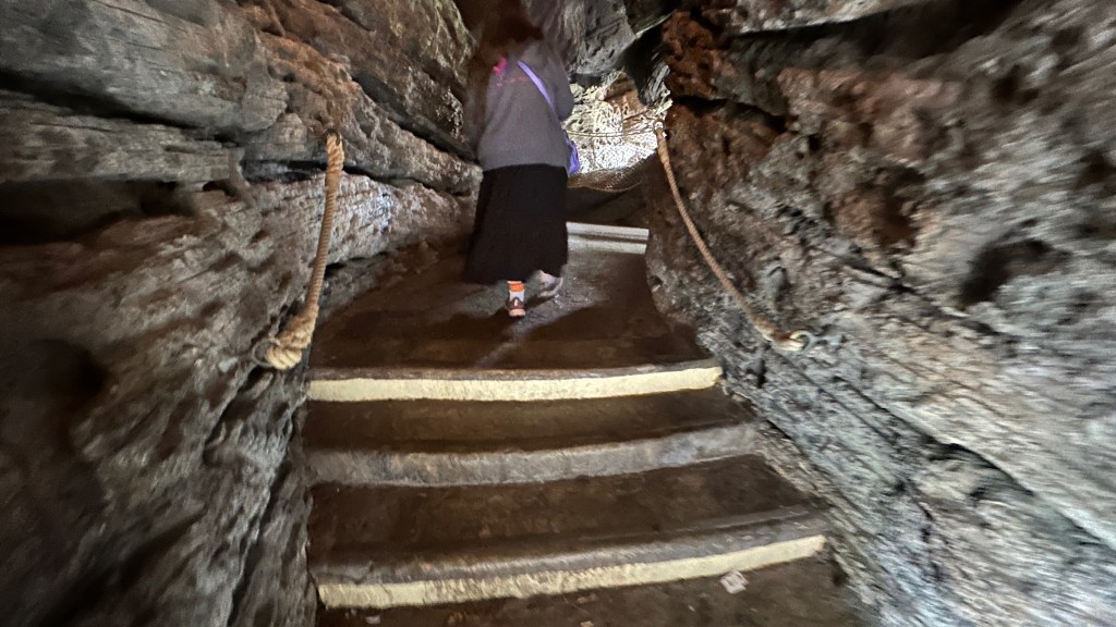Person walking up stairs in Adventure Isle in Disneyland Paris
