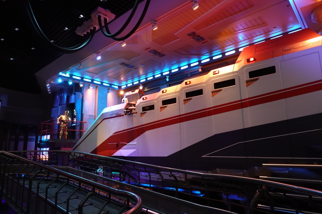 Star speeder vehicle with R2D2 and C3P0 models from the queue of Star Tours in Disneyland Paris