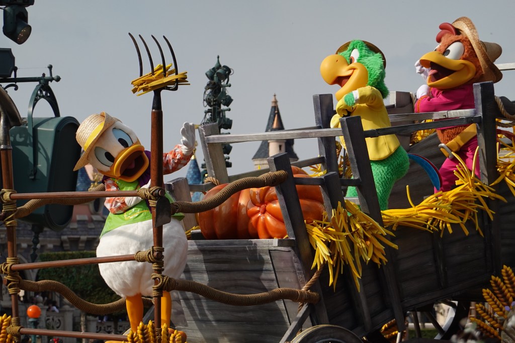 Donald Duck, Jose and Panchito on a prade float at Disneyland Paris
