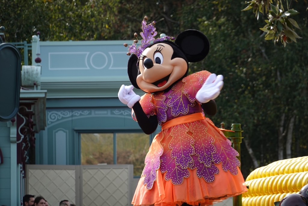 Minnie Mouse in an autumn themed dress at Disneyland Paris