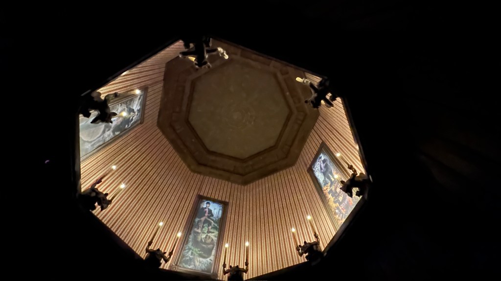 View up to portraits in the reshow of Phantom Manor in Disneyland Paris