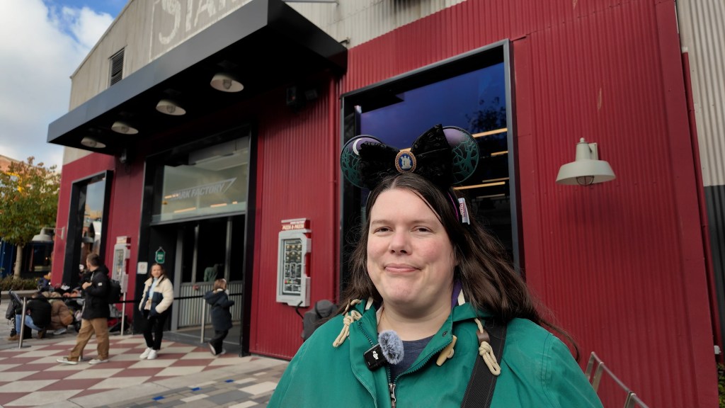 Woman outside of Stark Factory in Disneyland Paris