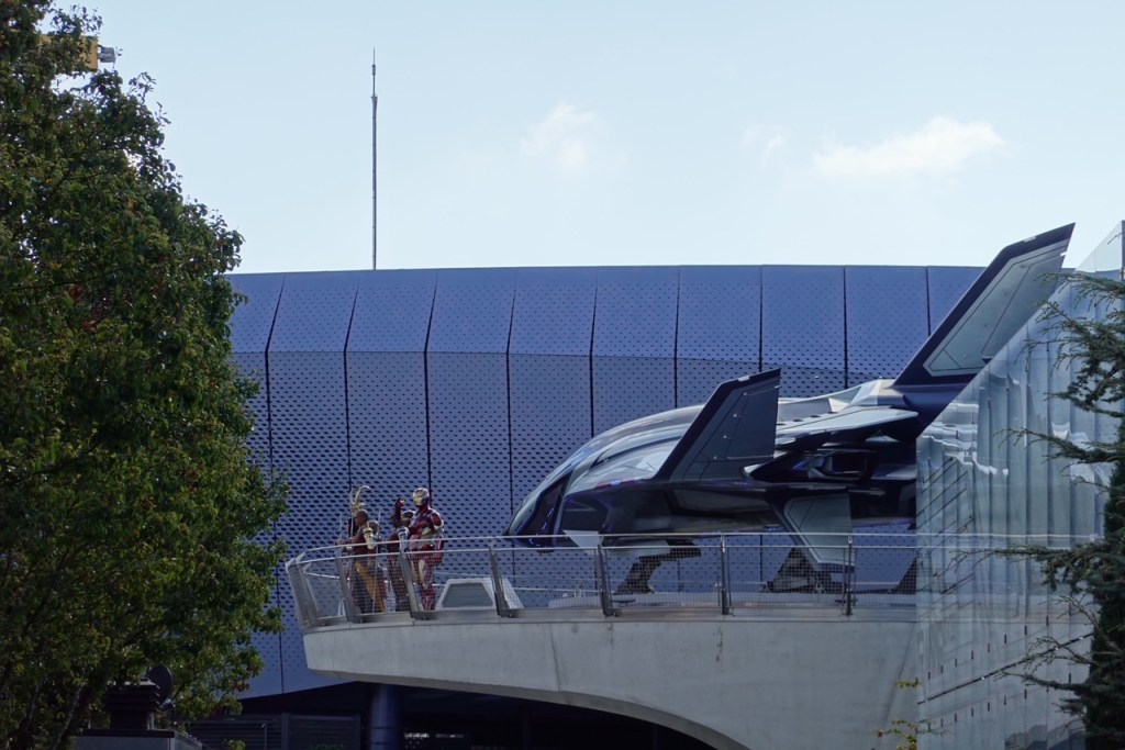 Iron Man, Loki and the Dora Milajae next to the Quintet in Avengers Campus in Disneyland Paris